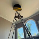 high ceiling chandelier installation in alpharetta, ga 4