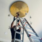 high ceiling chandelier installation in alpharetta, ga 7