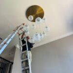 high ceiling chandelier installation in alpharetta, ga 9